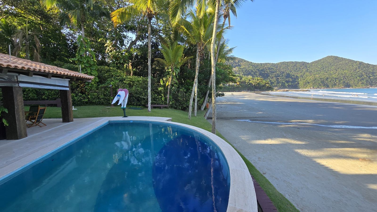 Área externa 13 — Iporanga, Guarujá, para locação, Casa