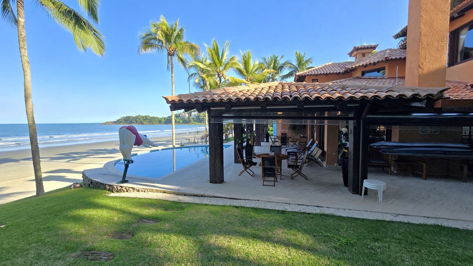 Área externa 22 — Iporanga, Guarujá, para locação, Casa