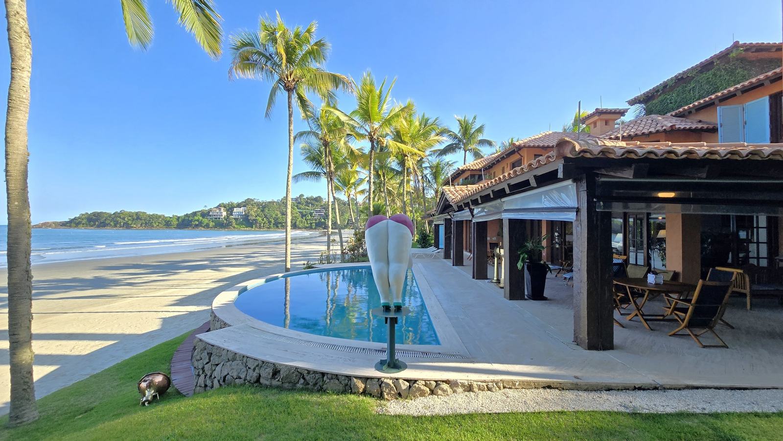 Área externa 21 — Iporanga, Guarujá, para locação, Casa