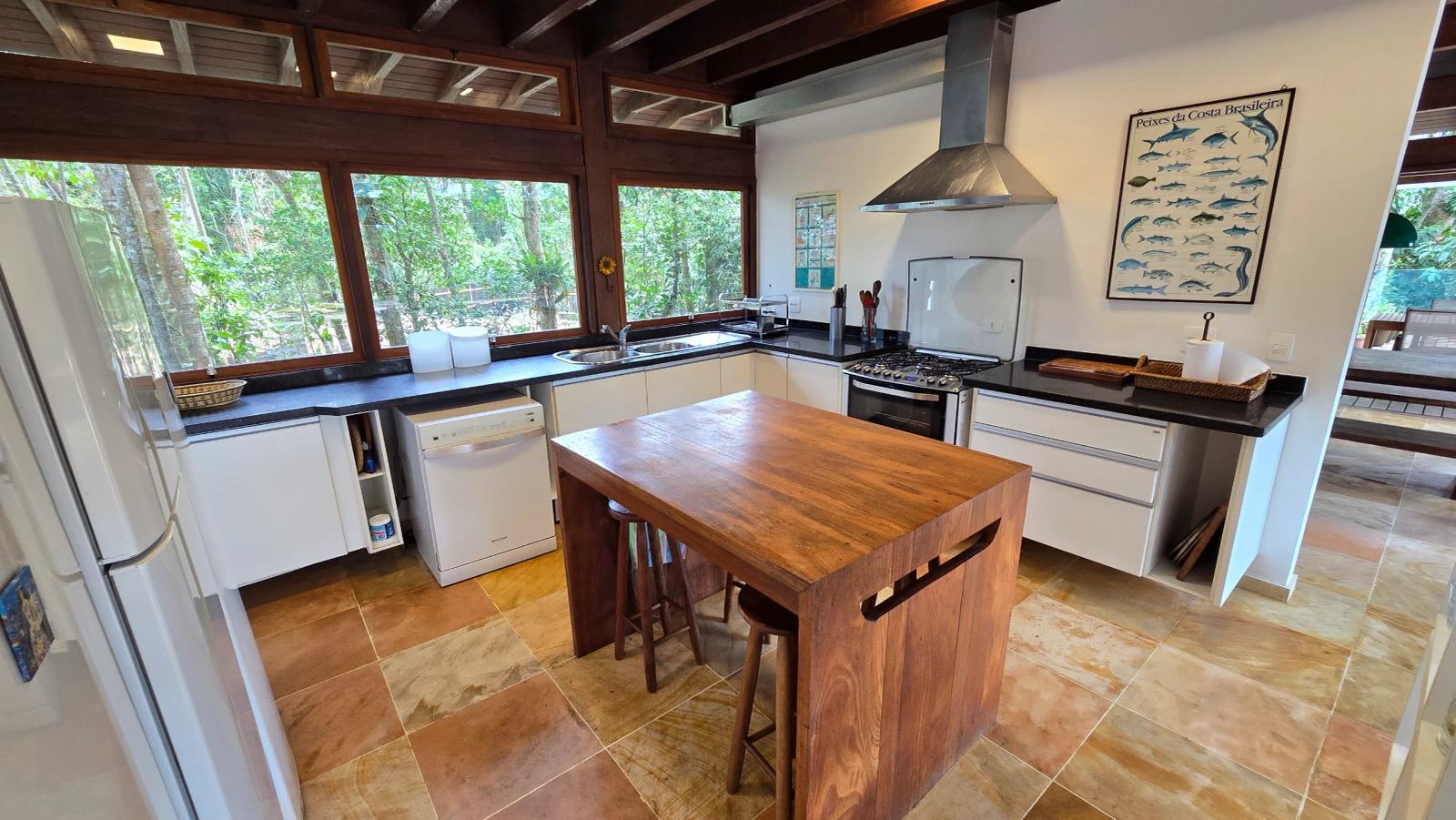 Área de serviço 1 — Iporanga, Guarujá, à venda e para locação, Casa